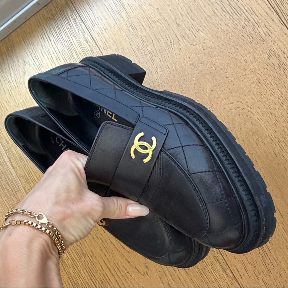 CHANEL Quilted Black Loafers with Gold Logo